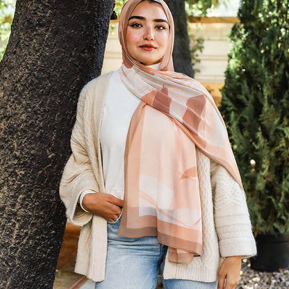 Three patterned scarves